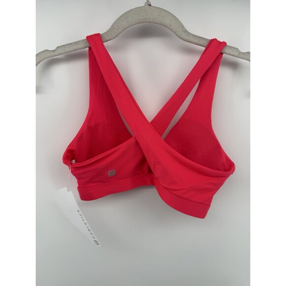 Fabletics Oasis Twist Medium Impact Sports Bra in Neon Pink - Size XS - Picture 2 of 3